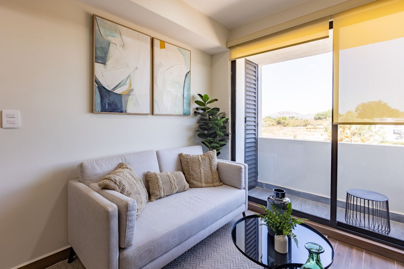 Sala del departamento muestra en venta en Capital Norte, Zapopan